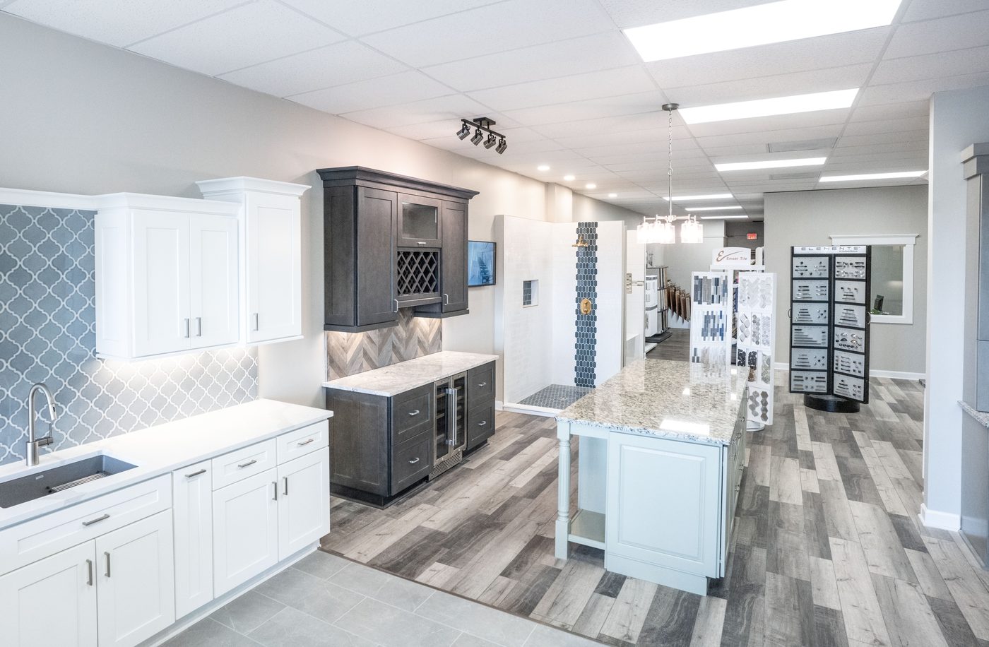 Finished basement den with a bar and dark tile flooring