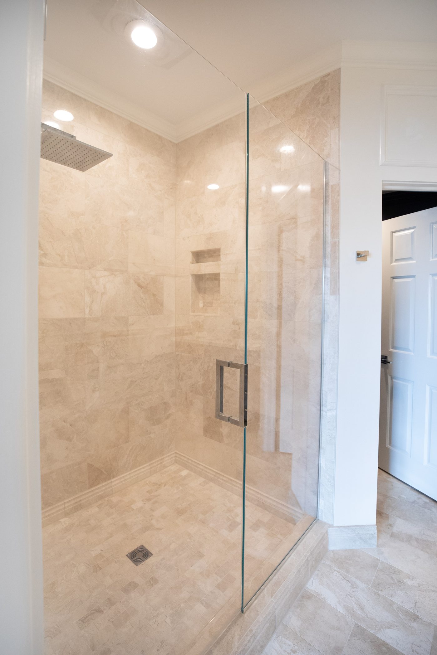 Walk-in glass tile shower remodel