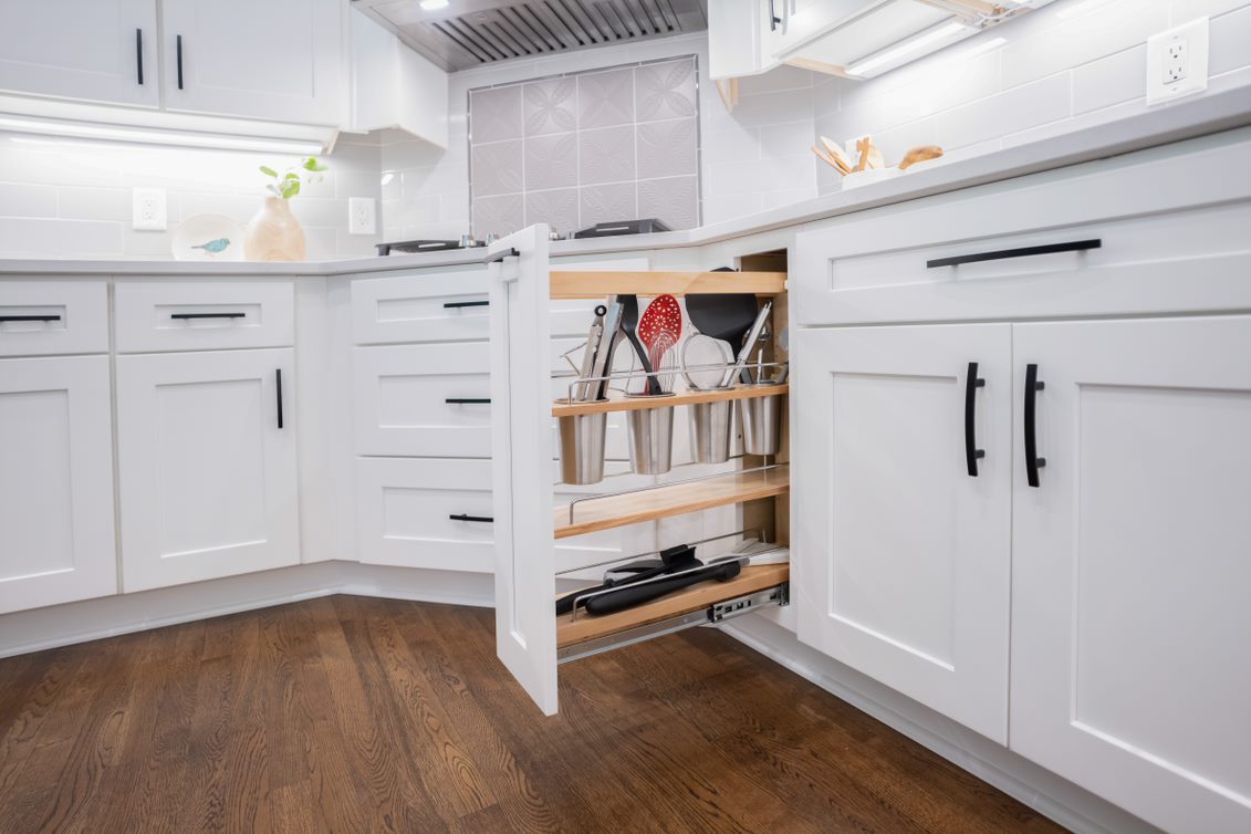 Custom cabinetry with a pull-out organizer drawer