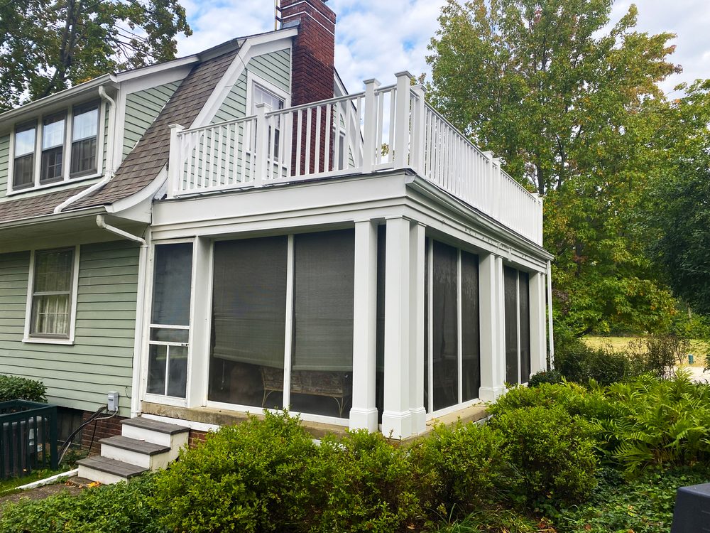 Home exterior remodel with a covered porch